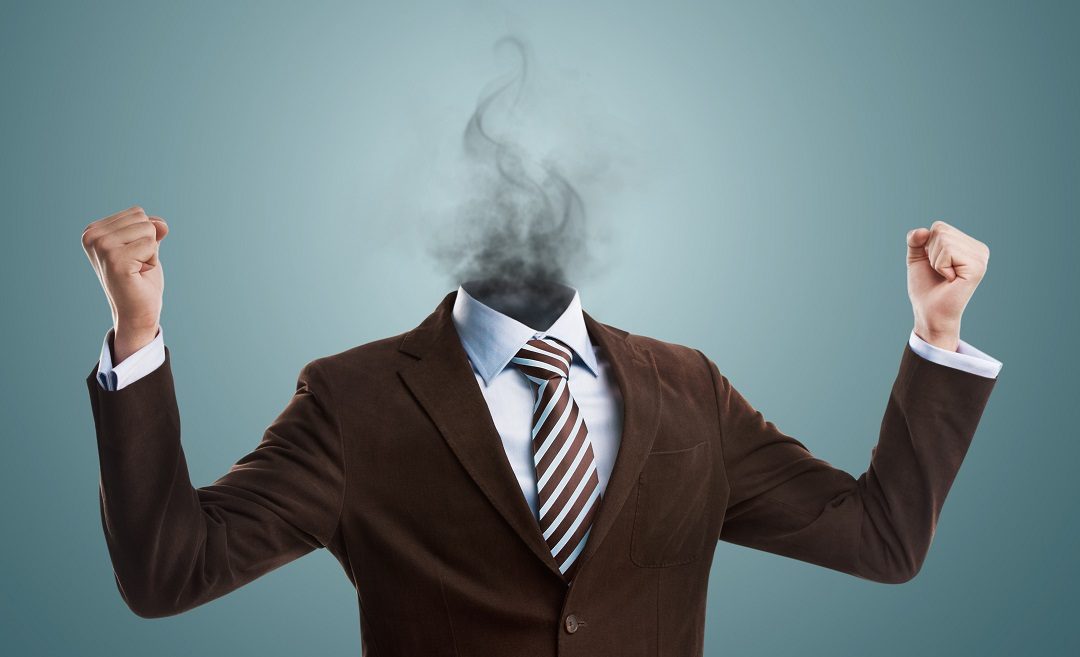 Overworked business man standing headless with smoke